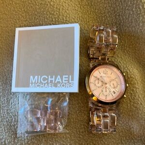 Michael Kors ladies watch in near perfect condition.